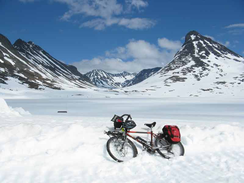 My bike amongst snow and mountains